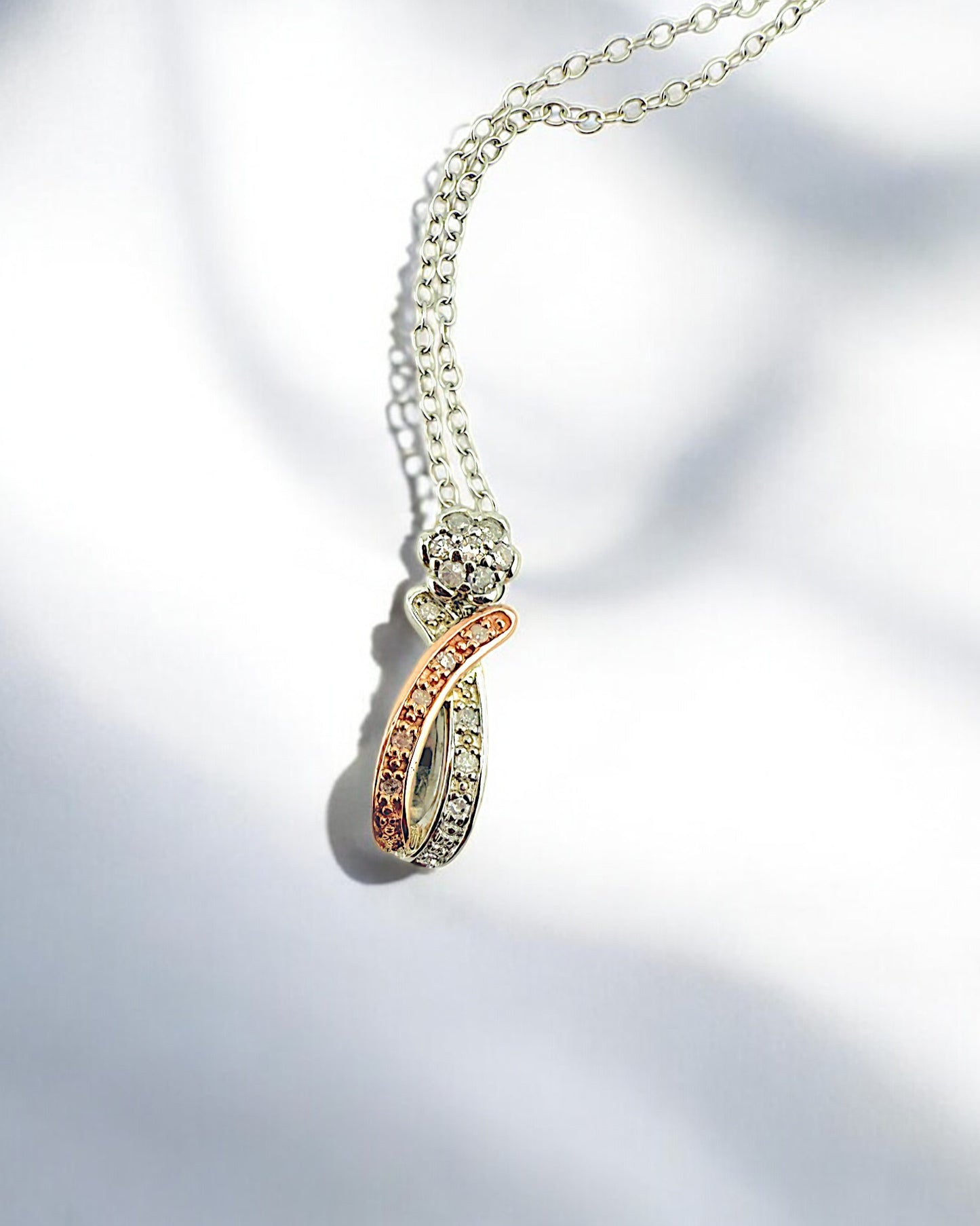 Silver and Rose Gold Intertwined Pendant Necklace